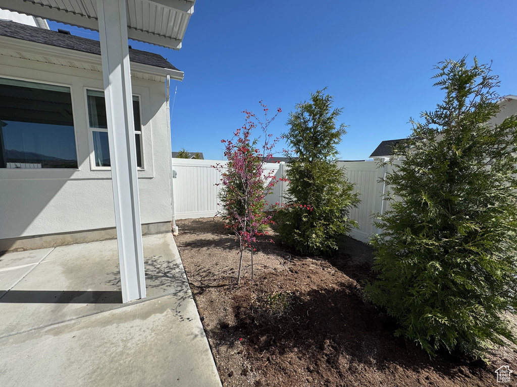 View of yard featuring a fenced backyard