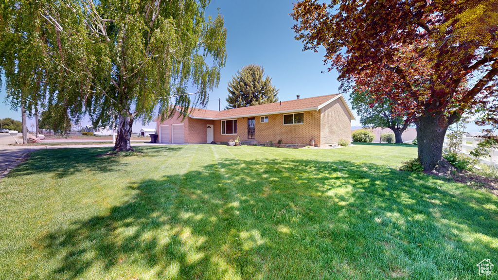 Exterior space with an attached garage