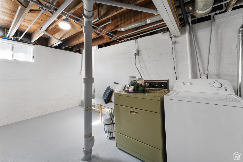 Clothes washing area with washing machine and clothes dryer and laundry area