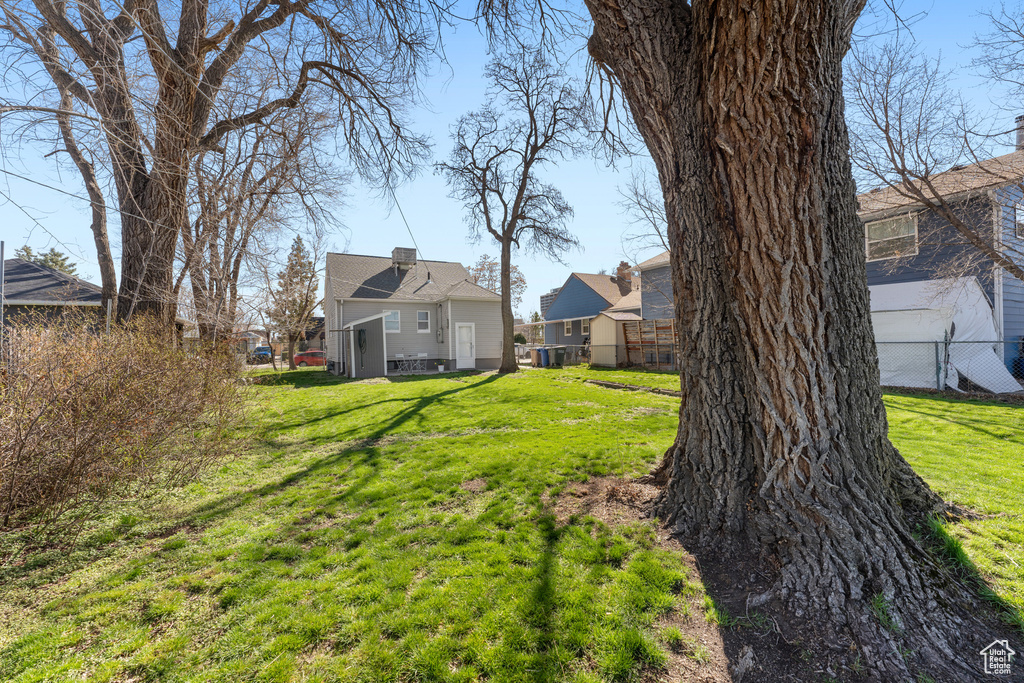 View of yard with fence