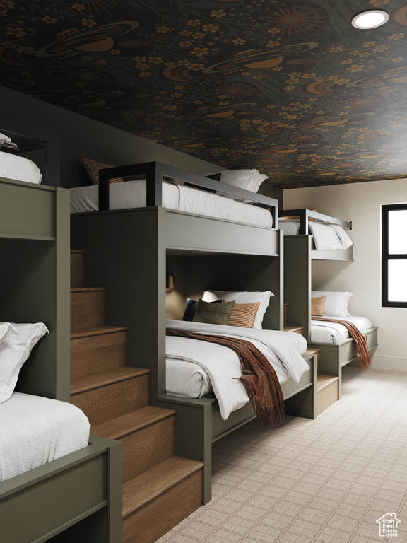 Bedroom with carpet floors and baseboards