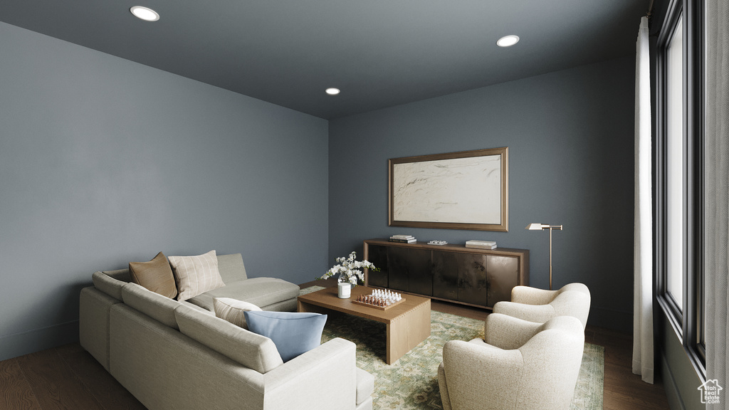 Living room with wood finished floors and recessed lighting