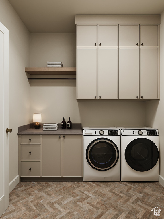 Laundry area featuring cabinet space, independent washer and dryer, and light carpet