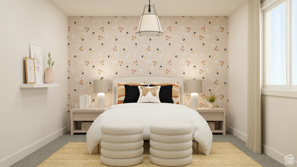Carpeted bedroom with wallpapered walls and baseboards