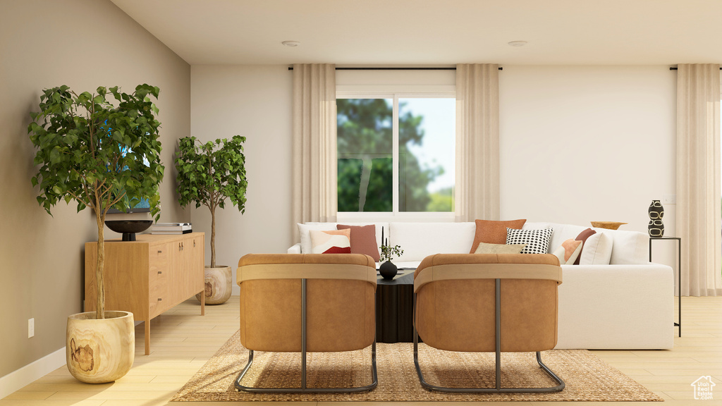 Living area with light wood-type flooring and baseboards