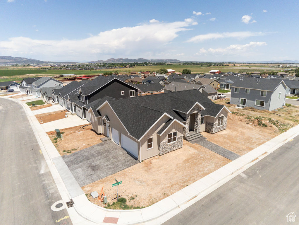 Aerial view of residential area with mountains