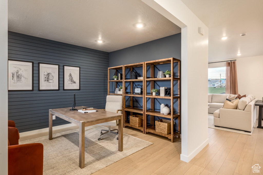 Office space with recessed lighting, baseboards, and wood finished floors