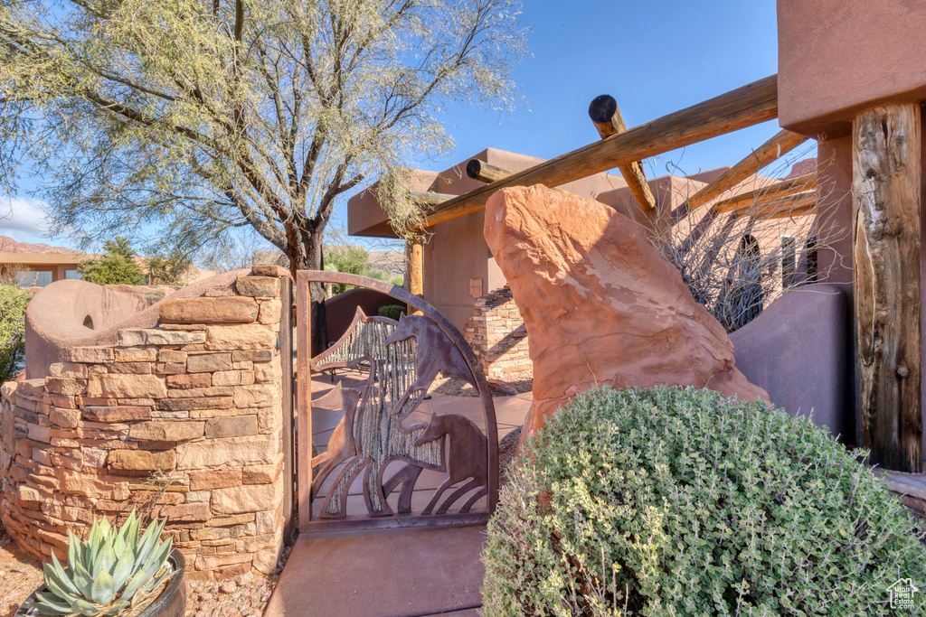 Exterior space featuring a gate