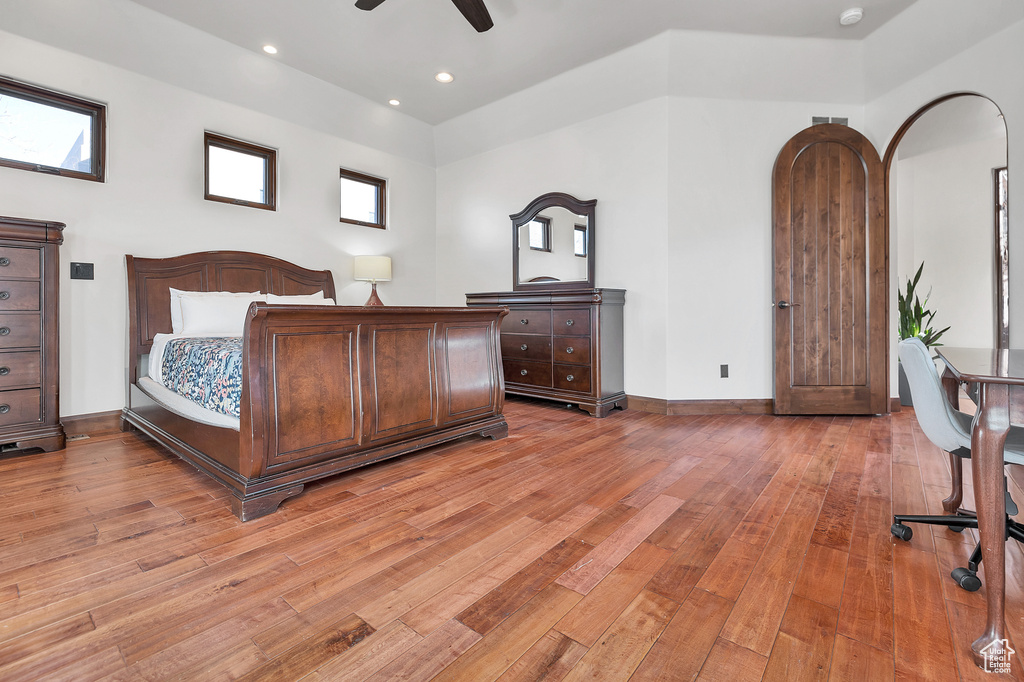 Bedroom with recessed lighting, light wood-style flooring, baseboards, and ceiling fan