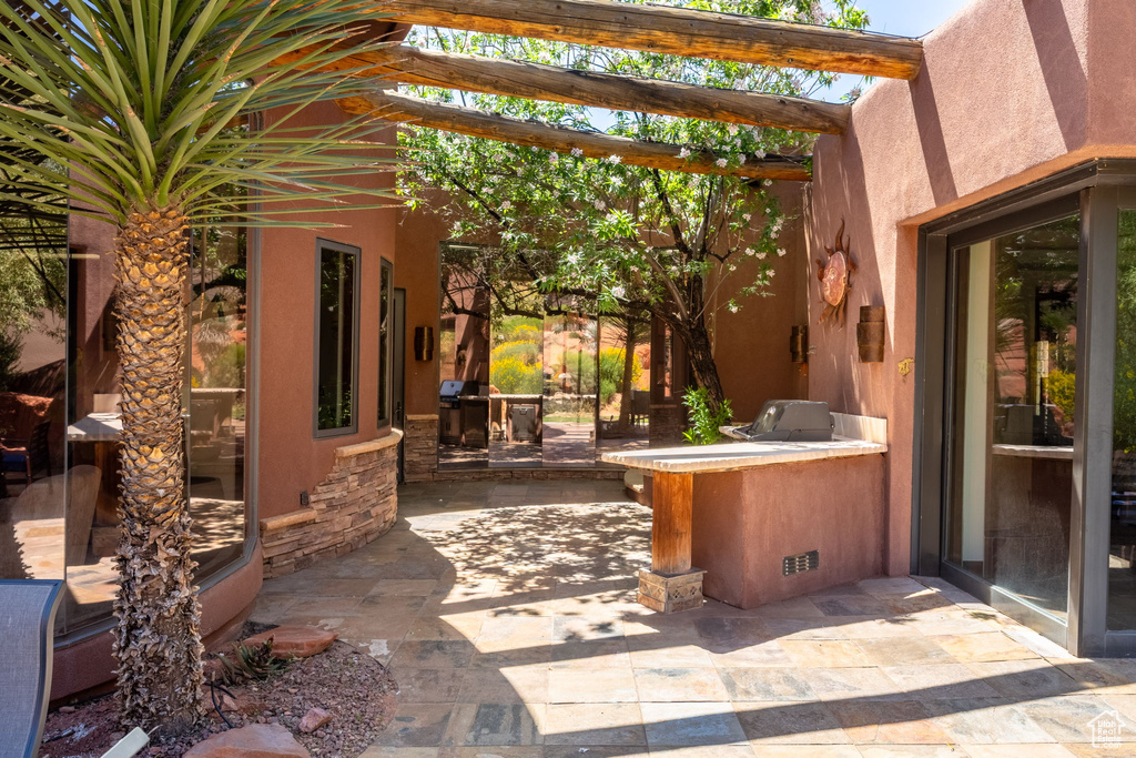 View of patio featuring grilling area