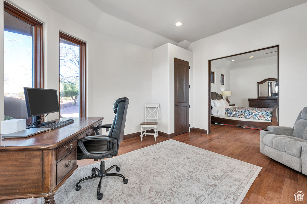 Office area with recessed lighting, baseboards, and wood-type flooring