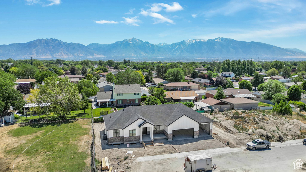 Aerial perspective of suburban area featuring mountains