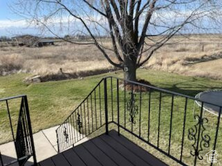 Deck featuring a yard