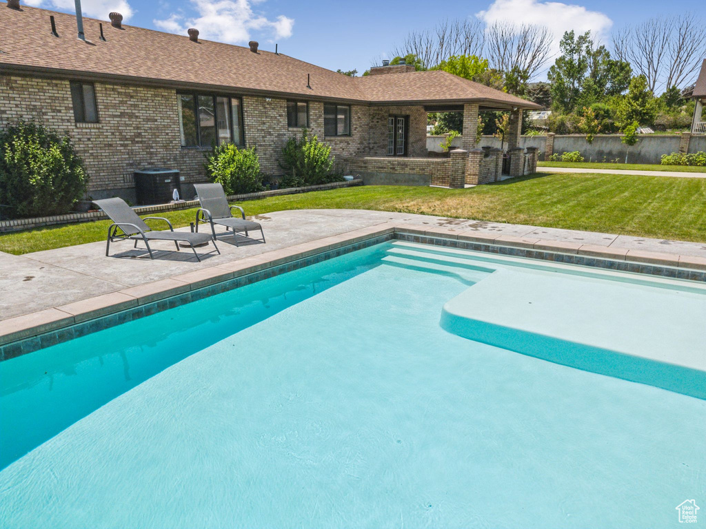 View of pool with a patio