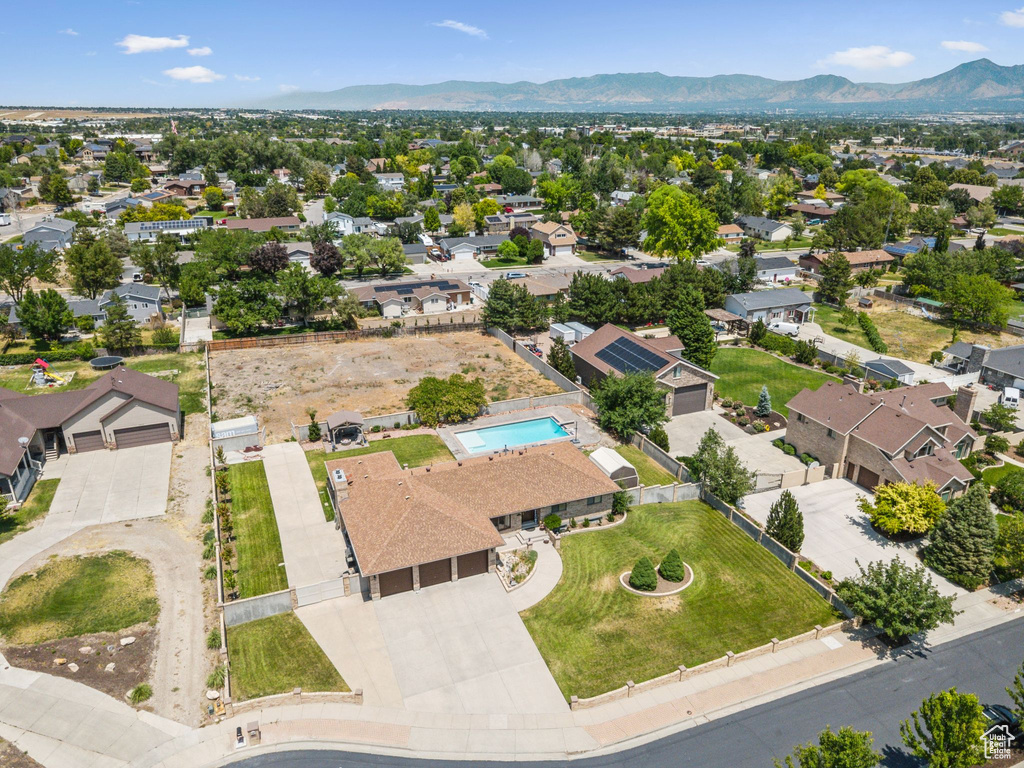 Aerial perspective of suburban area with mountains