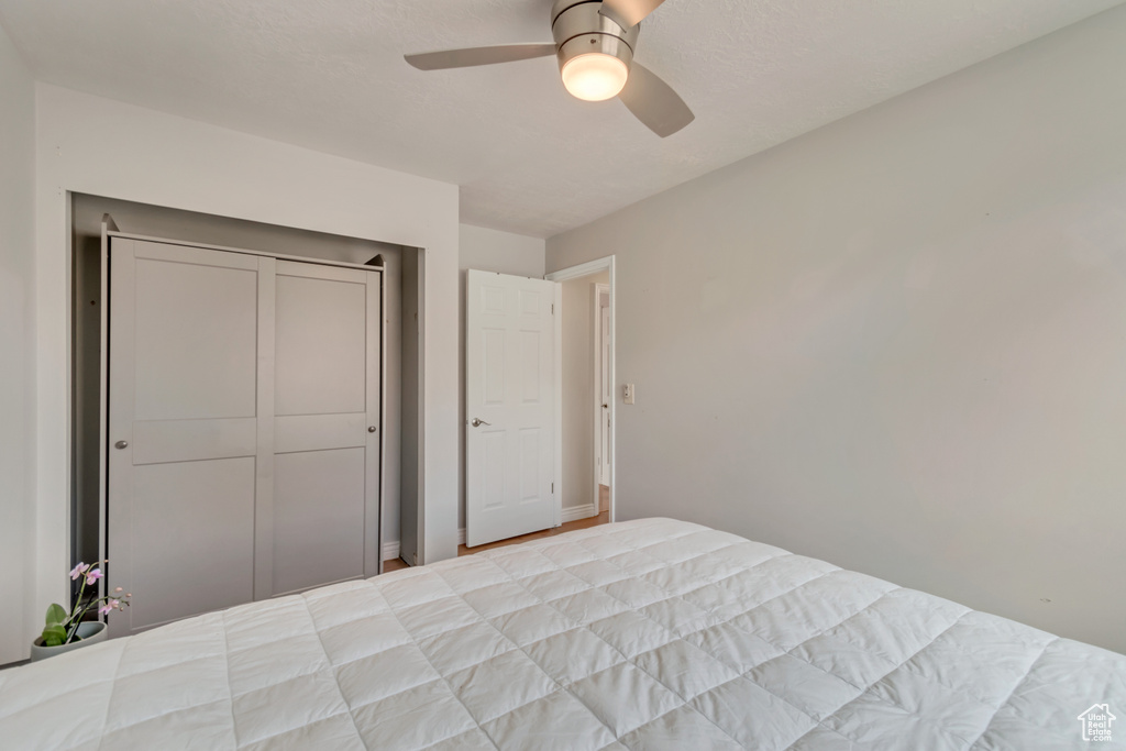 Unfurnished bedroom with ceiling fan