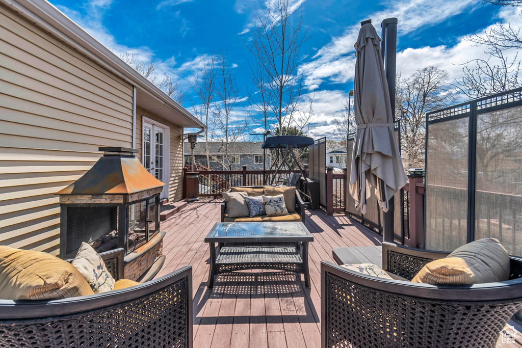 Wooden terrace with an outdoor living space