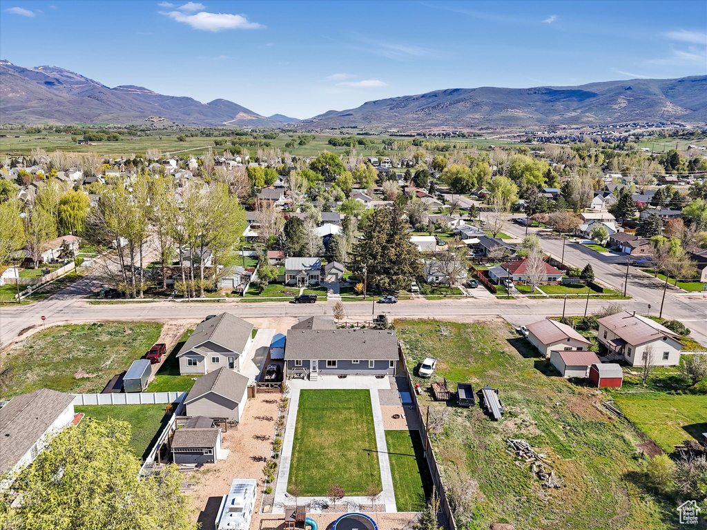 Aerial view of residential area with mountains