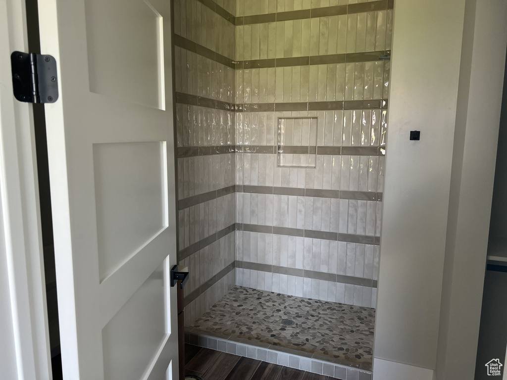 Full bathroom with a shower stall