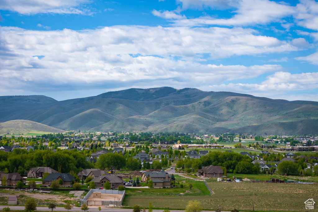 View of mountain background featuring nearby suburban area