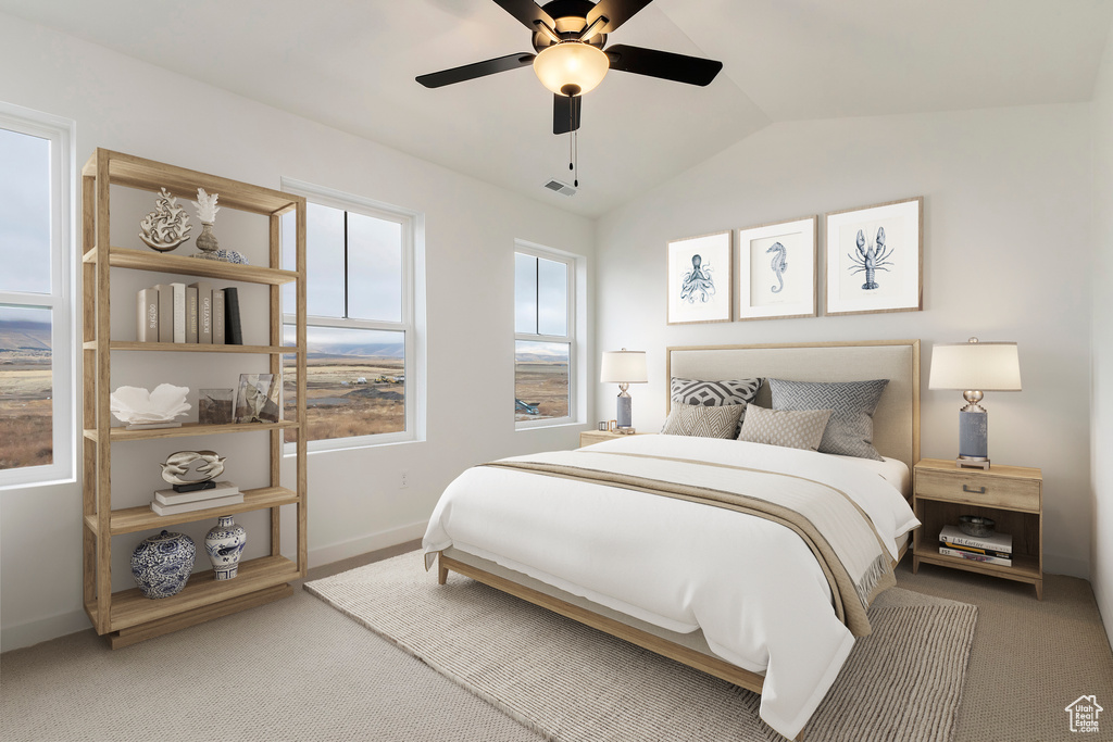 Bedroom with visible vents, light carpet, baseboards, ceiling fan, and vaulted ceiling