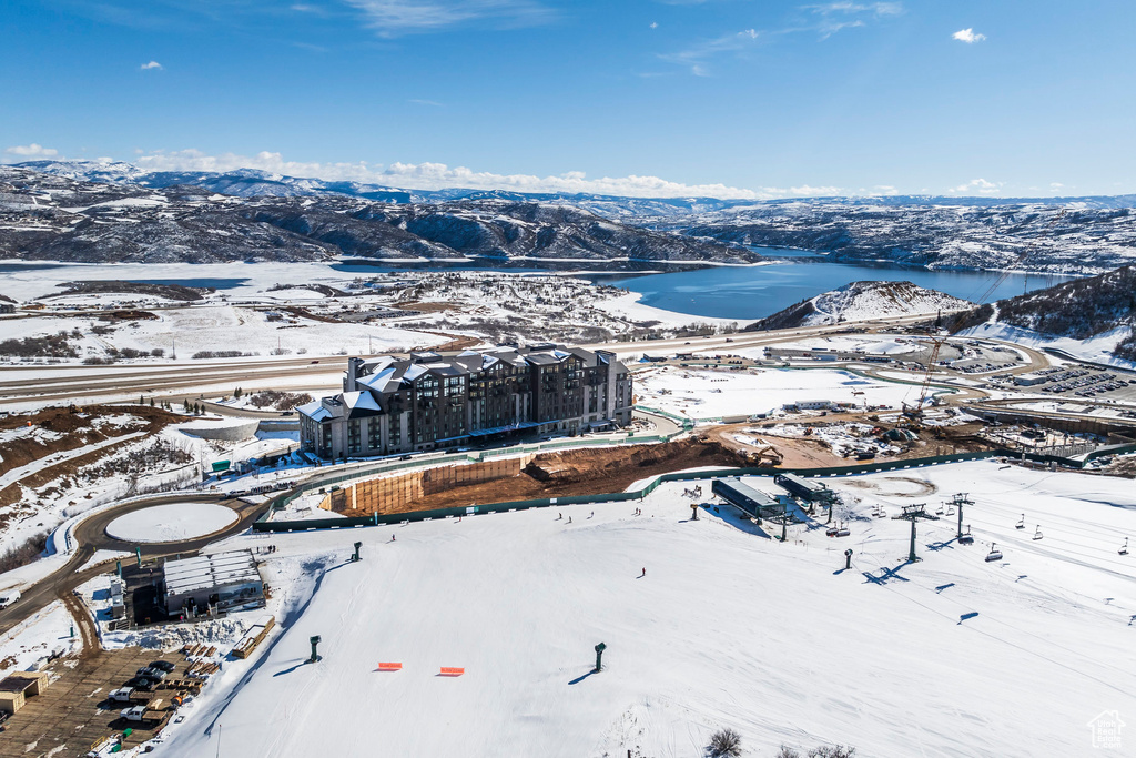 Snowy aerial view with a mountain view