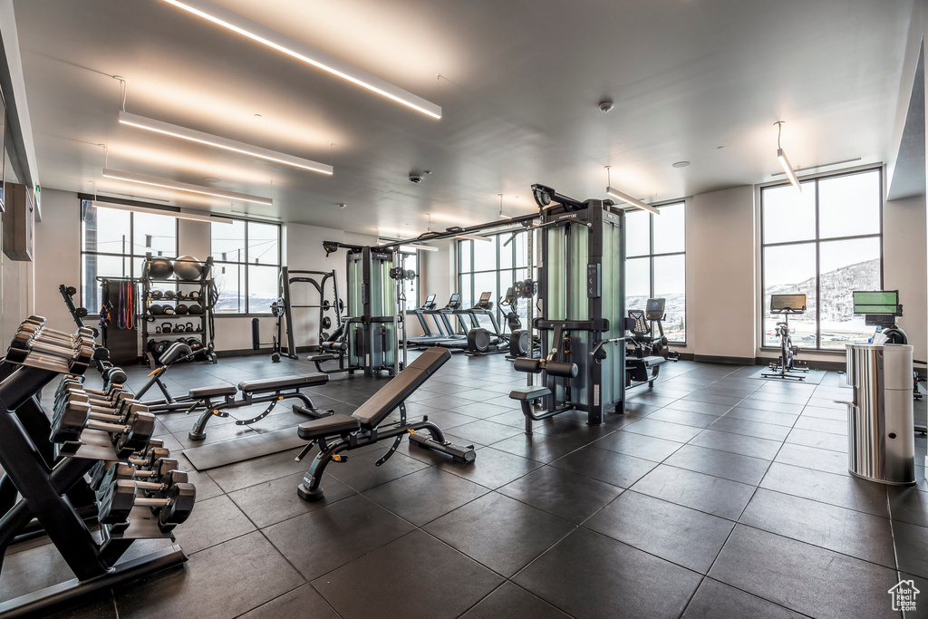 Exercise room with floor to ceiling windows