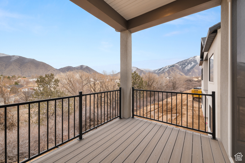 Wooden deck featuring a mountain view