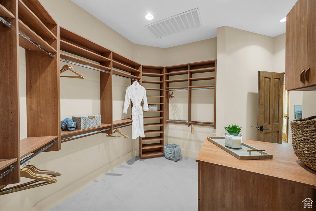 Walk in closet featuring visible vents