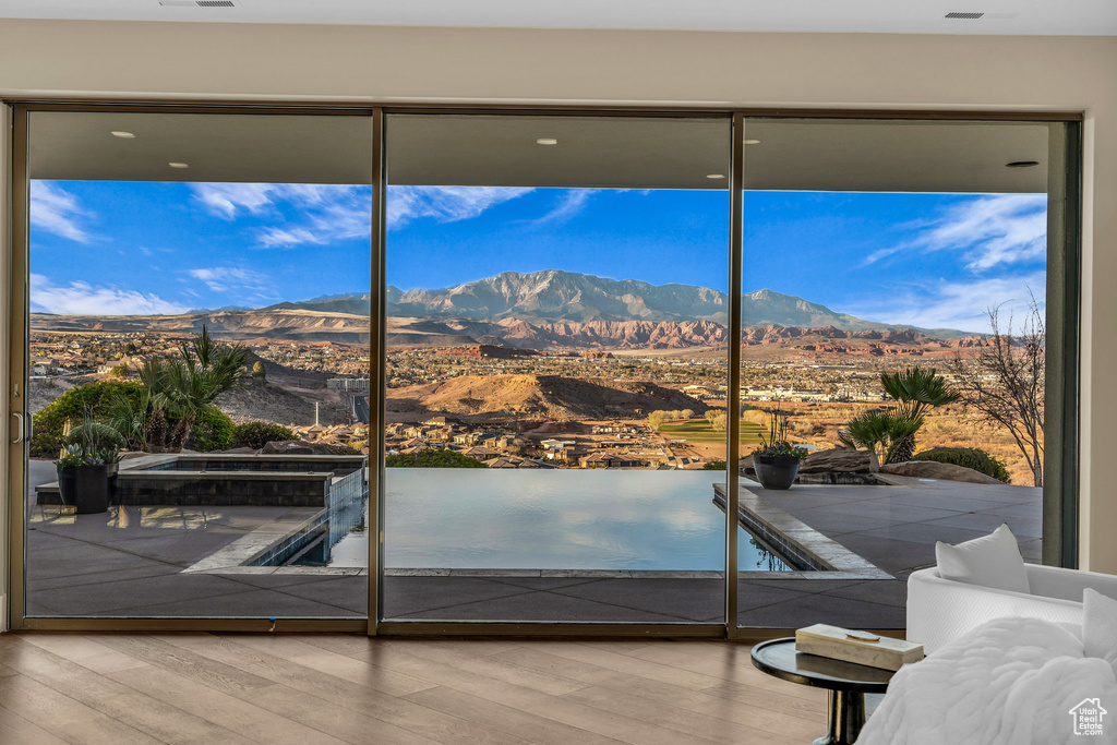 Interior space with visible vents and a mountain view