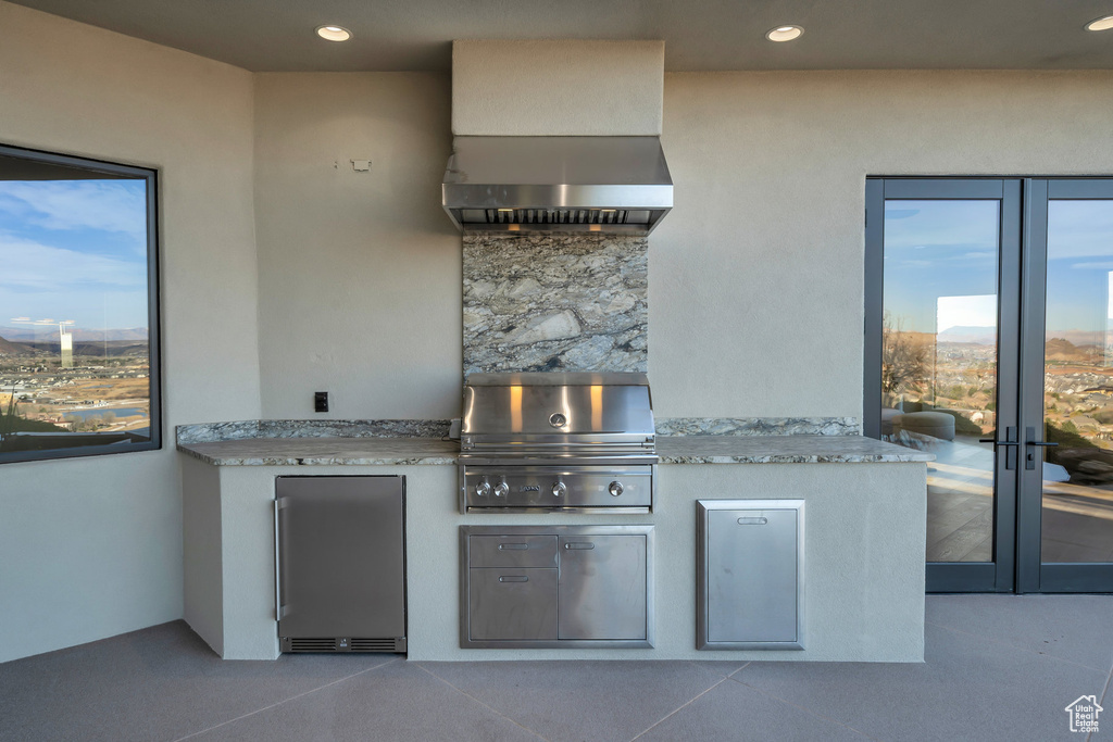 View of patio / terrace with an outdoor kitchen and grilling area