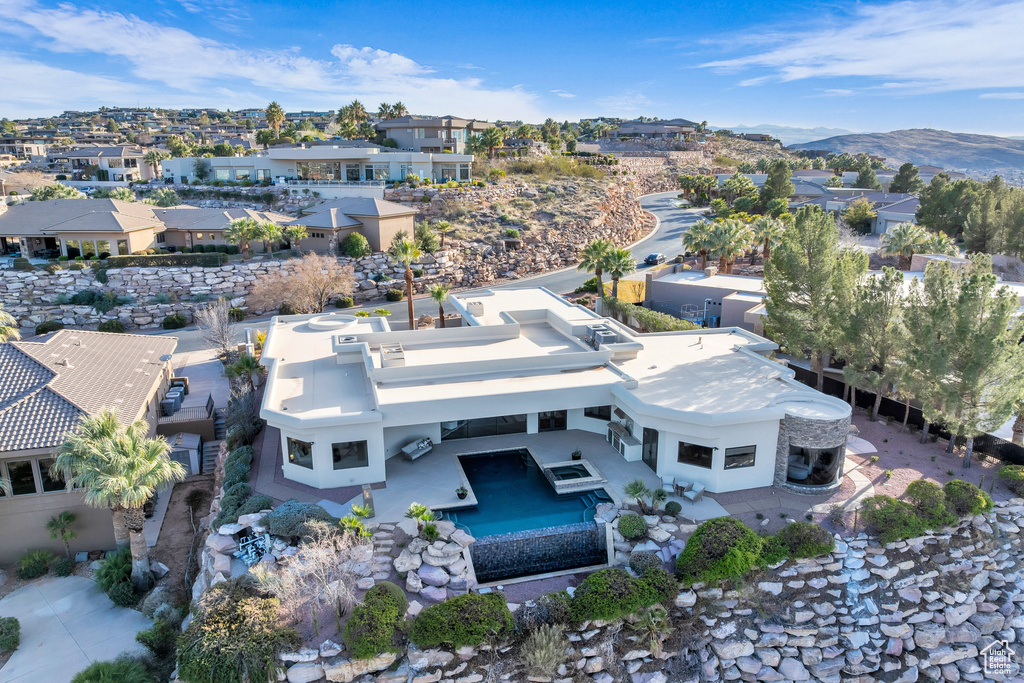 Birds eye view of property featuring a residential view and a mountain view