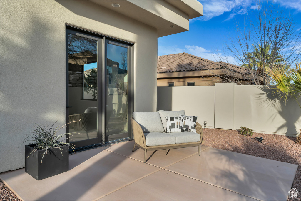 View of patio / terrace featuring fence