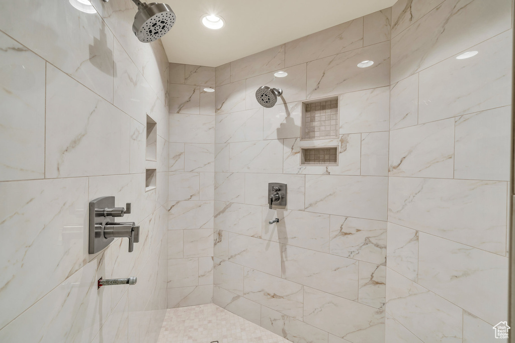Bathroom with tiled shower