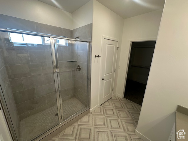 Full bath featuring a stall shower