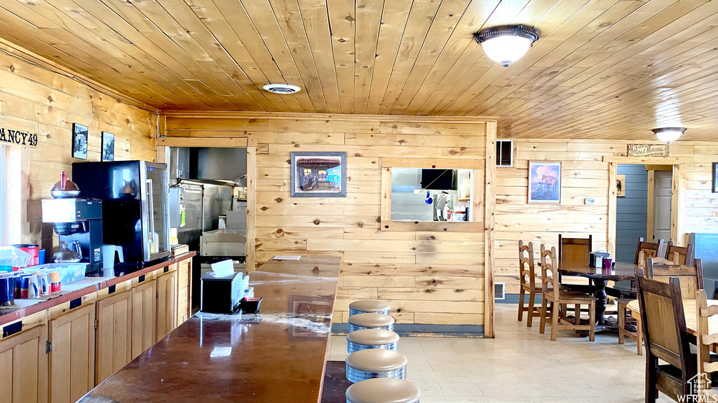 Interior space with wooden ceiling and wood walls