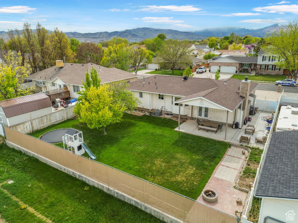 Drone / aerial view featuring a residential view and a mountain view