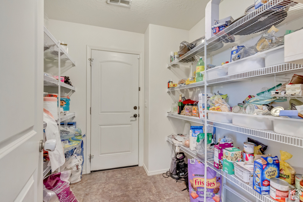 Storage area featuring visible vents