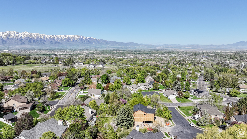 Drone / aerial view with a mountain view and a residential view