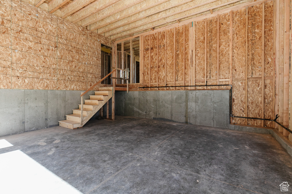 Basement featuring stairway