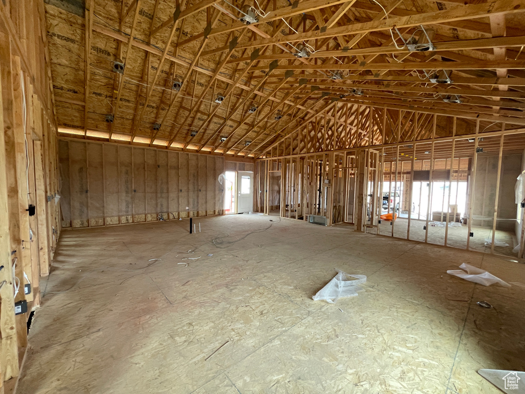 Miscellaneous room with a healthy amount of sunlight and vaulted ceiling