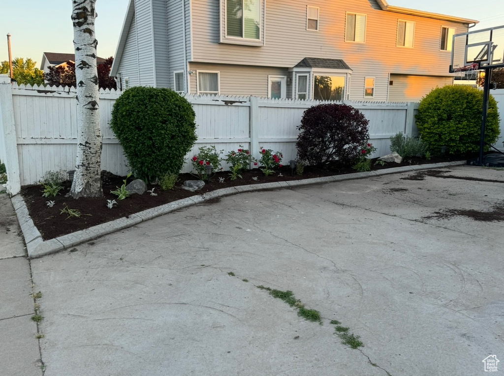 View of side of property with fence private yard