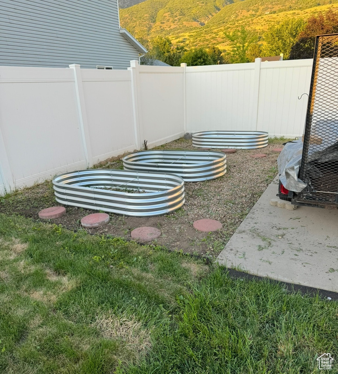 View of yard featuring fence