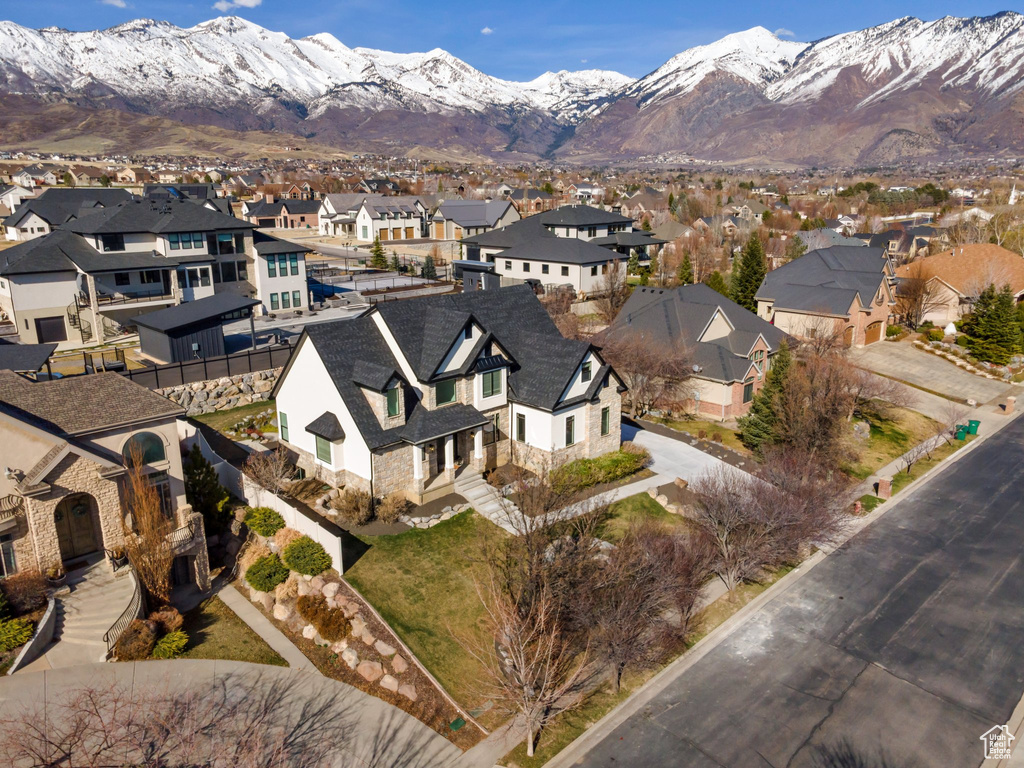 Drone / aerial view with a mountain view and a residential view