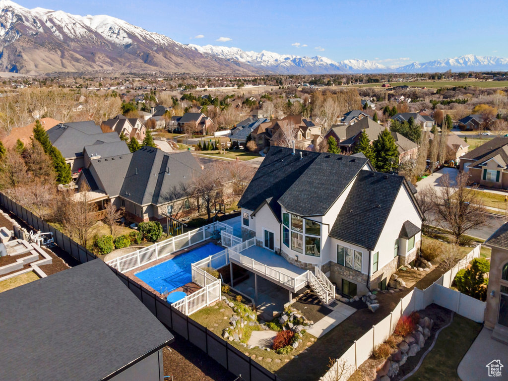 Drone / aerial view featuring a residential view and a mountain view
