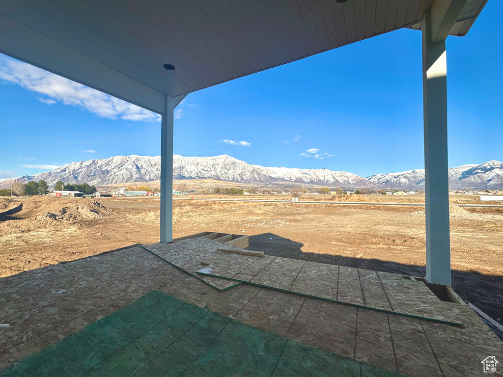 View of yard with a patio area and a mountain view