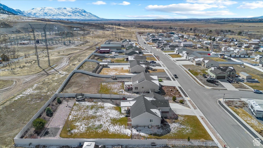 Birds eye view of property featuring a mountain view and a residential view