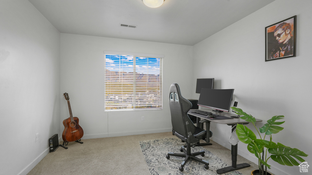 Office featuring visible vents, baseboards, and carpet flooring
