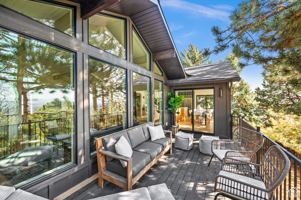Deck with an outdoor living space