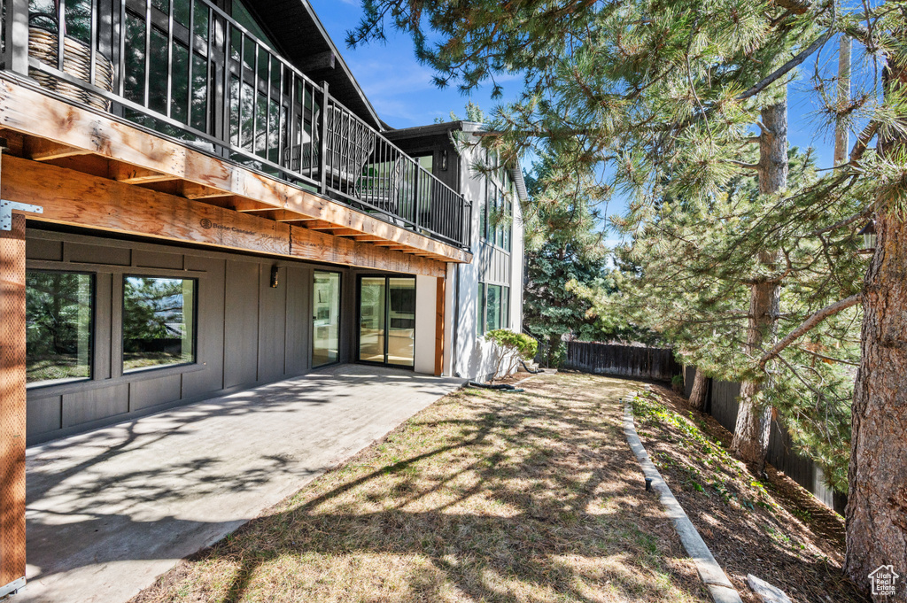 View of yard featuring a patio area and fence